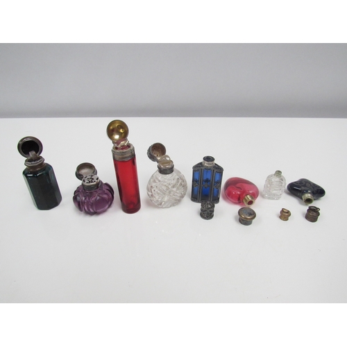 8183 - Eight small scent bottles, some with silver lids, heart shaped example etc. (8)