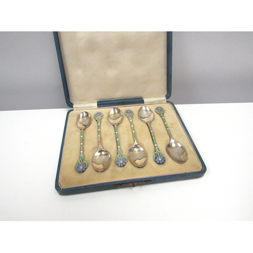 8192 - A set of six Turner & Simpson silver enamelled silver gilt teaspoons with floral terminals, Birmingh... 