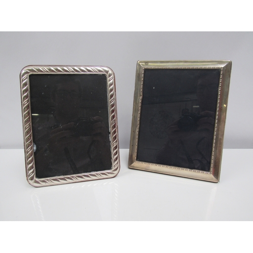 8203 - A wrythen form photograph frame marked 925, a Carrs of Sheffield silver beaded edge photograph frame... 