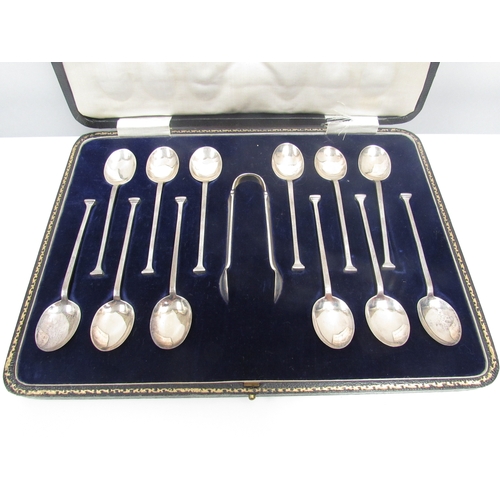 8212 - A set of twelve John Sanderson & Son Ltd tea spoons and tongs. 133g