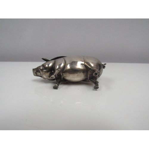 8215 - An Edwardian Adie & Lovekin Ltd silver pig pin cushion, Birmingham 1904. 7cm long