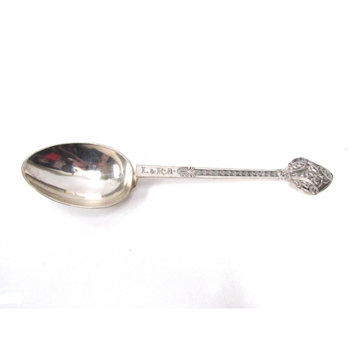 8216 - A Norwegian 830 standard silver Celtic design spoon, engraved initials, backs stamped Thune 830. 21.... 