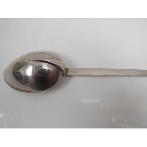 8216 - A Norwegian 830 standard silver Celtic design spoon, engraved initials, backs stamped Thune 830. 21.... 