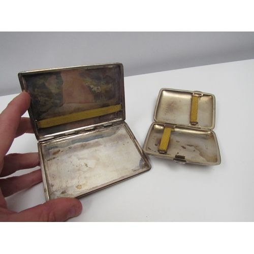 8221 - Two cigarette cases including Arabic white metal and Fergenbaum and Son, Birmingham 1946