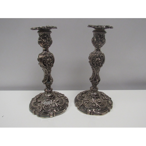 8225 - A 19th Century pair of James Kirkby, Gregory & Co. embossed candlesticks with wrythen base, Sheffiel... 