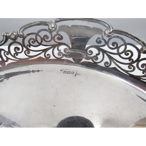 8226 - A Walker & Hall silver pierced dish on raised feet, Sheffield 1915. 29cm long x 18.5cm wide. 399g