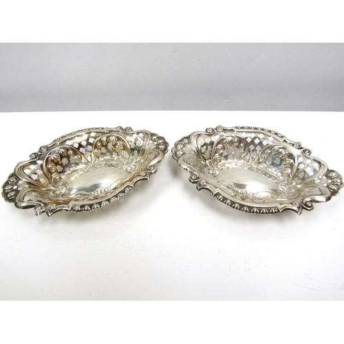 8232 - A Collingwood & Sons ltd silver sugar castor (misshapen) Birmingham 1933, pair of William Aitken pie... 