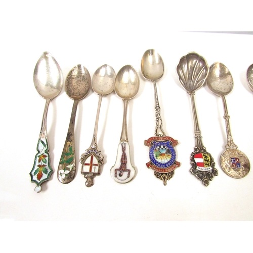 8255 - 14 various silver souvenir spoons, 212g