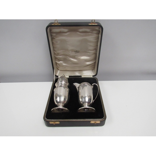 8261 - A Barker Brothers Silver Ltd cream jug and sugar castor, Birmingham 1934, used. 248g