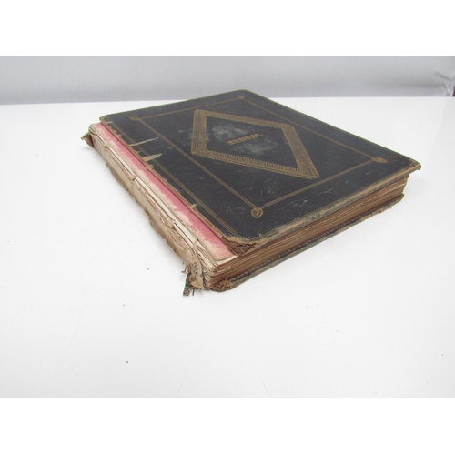 8267 - A 19th Century diary/album dating from March 1845 with music, verse and sketches, binding poor. 24cm... 