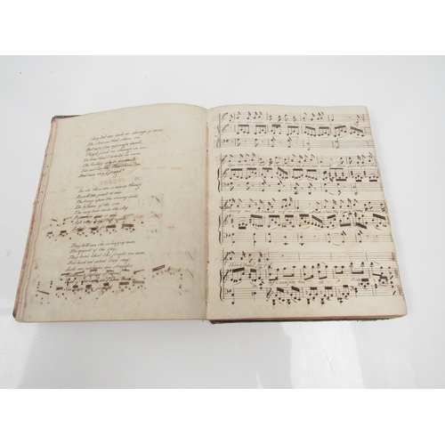 8267 - A 19th Century diary/album dating from March 1845 with music, verse and sketches, binding poor. 24cm... 