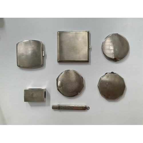 8201 - Five silver compacts including Art Deco, a silver matchbox cover and silver engraved pencil holder (... 