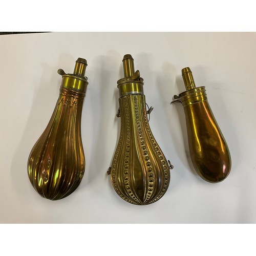 5227 - Three 19th Century copper powder flasks, one with beaded design