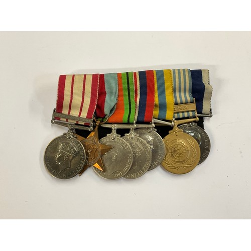 5393 - A medal group of seven consisting of George VI Naval General Service Medal (GSM) with Palestine 1938... 