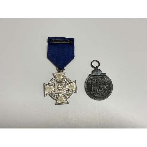 5395 - A Third Reich Era German 25 year Faithful Service Medal and an Eastern Front Medal (2)