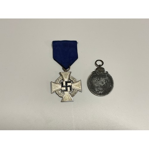 5395 - A Third Reich Era German 25 year Faithful Service Medal and an Eastern Front Medal (2)