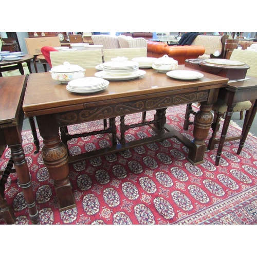 1108 - An 18th Century style oak draw-leaf dining table and six dining chairs, 74cm tall x 180cm long x 77c... 