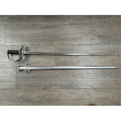 5433 - An 1897 pattern cavalry officer's sword, chromed and presumed to be a NCO as blade unmarked, with sc... 