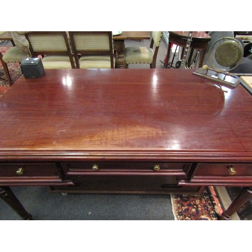 1159 - A Victorian style writing table of three faux and three frieze drawers on turned and carved legs. 78... 