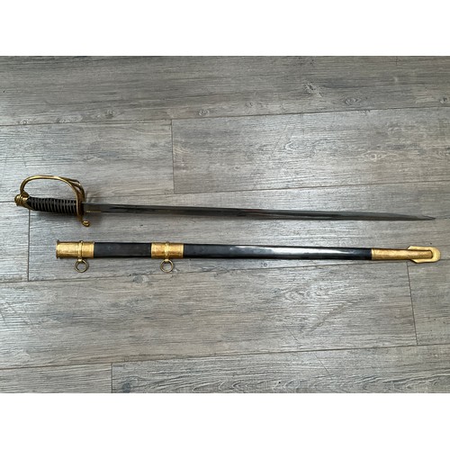 5430 - A replica Confederate sword, brass guard with CS pierced brass hilt, engraved blade with single full... 