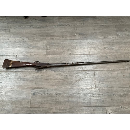 5334 - A 19th Century percussion musket with drum and nipple conversion, faintly stamped Springfield and th... 