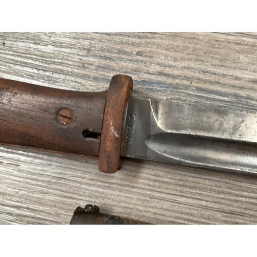 5151 - A Third Reich era German Mauser bayonet, the blade marked WKC, dated 1938, with 1939 Berg and Co sca... 