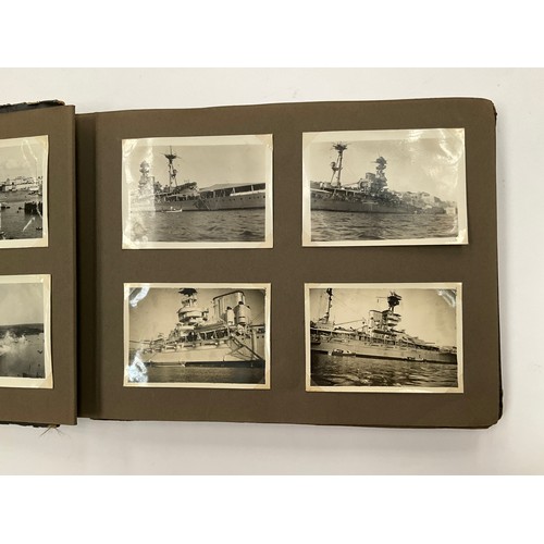 5352 - A WWII photograph album including British service aircraft, bombing, naval battleships and aircraft ... 