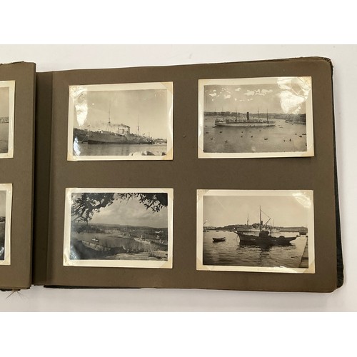 5352 - A WWII photograph album including British service aircraft, bombing, naval battleships and aircraft ... 