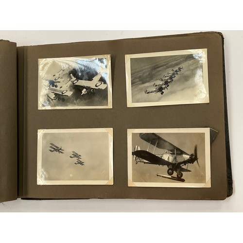 5352 - A WWII photograph album including British service aircraft, bombing, naval battleships and aircraft ... 