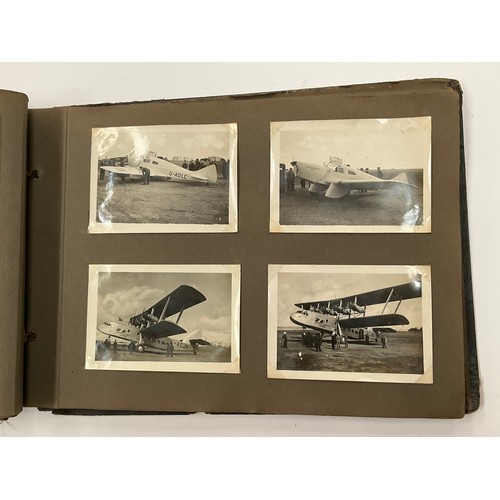 5352 - A WWII photograph album including British service aircraft, bombing, naval battleships and aircraft ... 