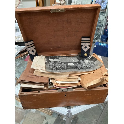 5122 - A WWII and pre-war collection of ephemera within a wooden box including maps of Burma, service books... 