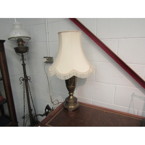 1004 - A 19th Century brass oil lamp converted to an electric table lamp           (E) £20-30