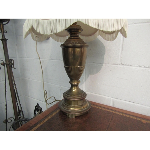 1004 - A 19th Century brass oil lamp converted to an electric table lamp           (E) £20-30