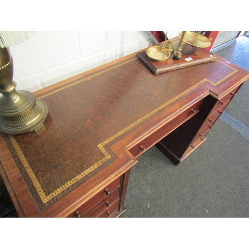 1005 - A 19th Century twin pedestal breakfront mahogany desk with tooled leather insert, 70cm x 120cm x 54c... 