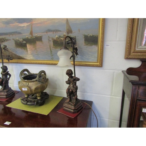 1014 - A pair of figural lamps of children with dogs