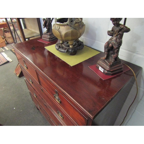 1016 - A George III mahogany straight front chest of two short over three long drawers with brass handles, ... 