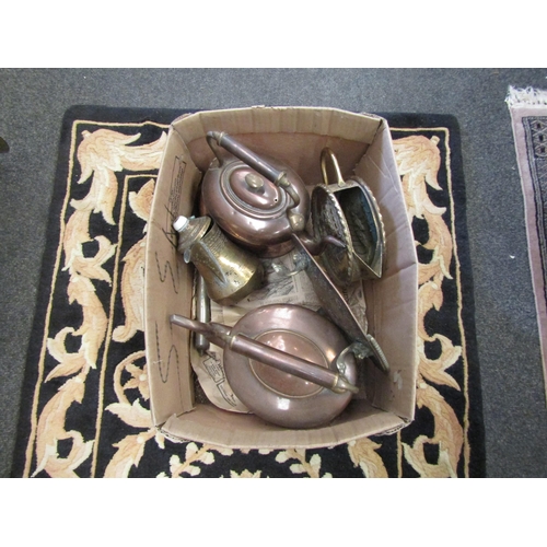 1028 - Two boxes of copper and brass wares including teapots, candlesticks etc