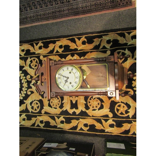 1045 - A Lincoln wall clock together with a box containing mantel clock, record player etc