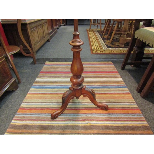 1106 - A Victorian tapestry panelled walnut pole screen