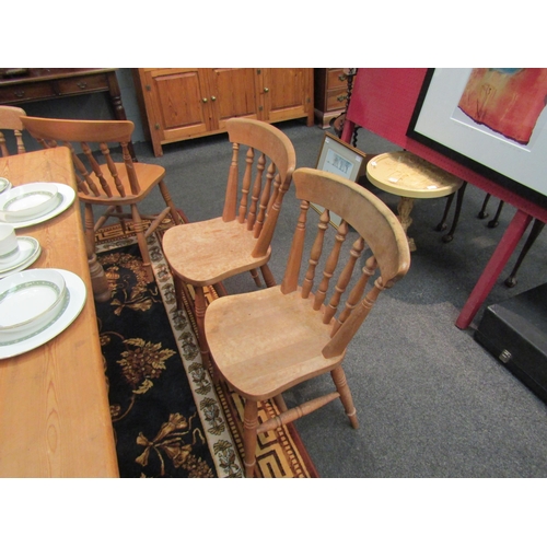 1113 - A set of seven pine kitchen chairs