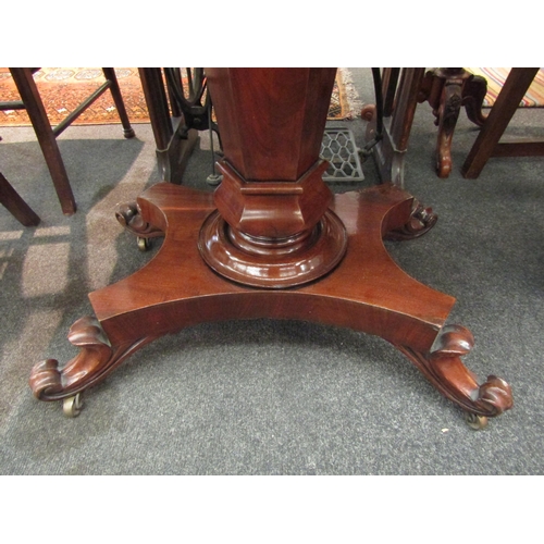 1114 - A late Regency mahogany folding tea table on flared hexagonal column and concave rectangular plateau... 