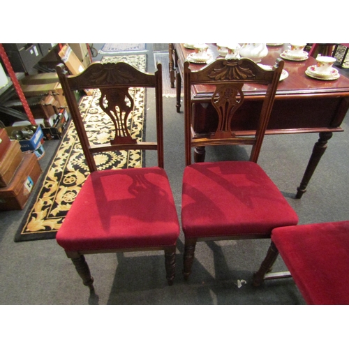 1160 - Four Victorian/Edwardian dining chairs including carved back example