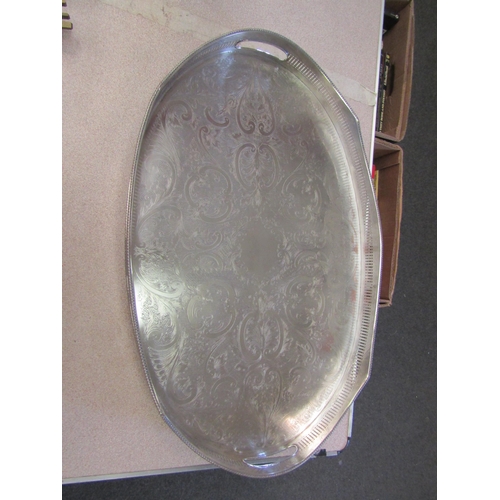 1204 - A large silver plated galleried tray on claw feet                    (R) £0