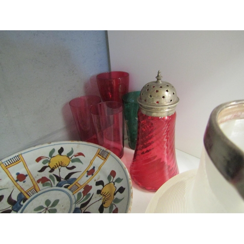 1274 - A selection of glassware inclusing cranberry sugar sifter, silvered glass vase and ribbed glass jug ... 