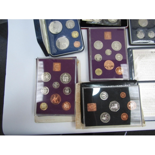 1295 - A selection of 1970's First Day Cover coin sets including sterling silver proof medals