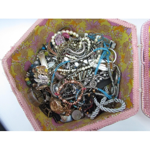 1333 - A vintage sewing box containing a large quantity of costume jewellery and watches