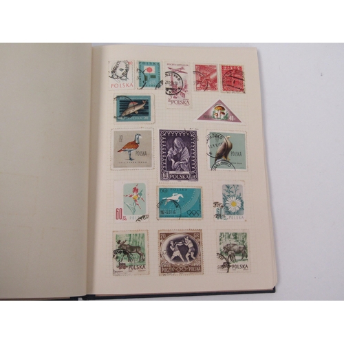 1320 - Three albums of Great Britain and Worldwide stamps. also a First Day cover of RNLB Spirit of Lowesto... 