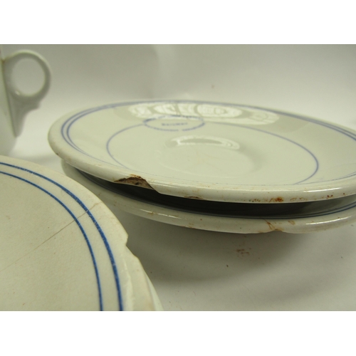 4063 - An LNER drinking cup and four similar LNER saucers, all a/f   (E) £12-18