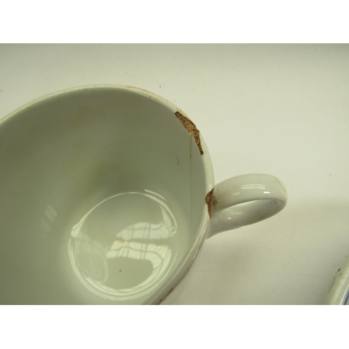 4063 - An LNER drinking cup and four similar LNER saucers, all a/f   (E) £12-18