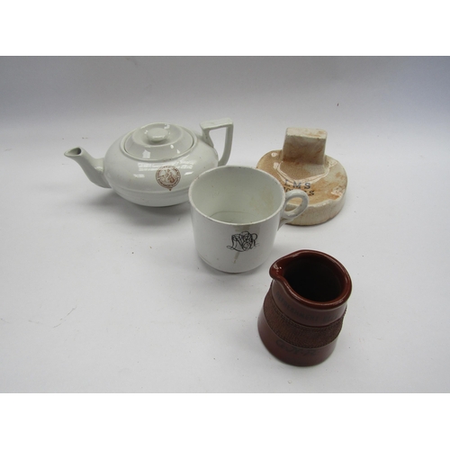 4071 - Four pieces of pre-nationalisation company crockery to include LNWR teapot, LNER tea cup, GNR cream ... 